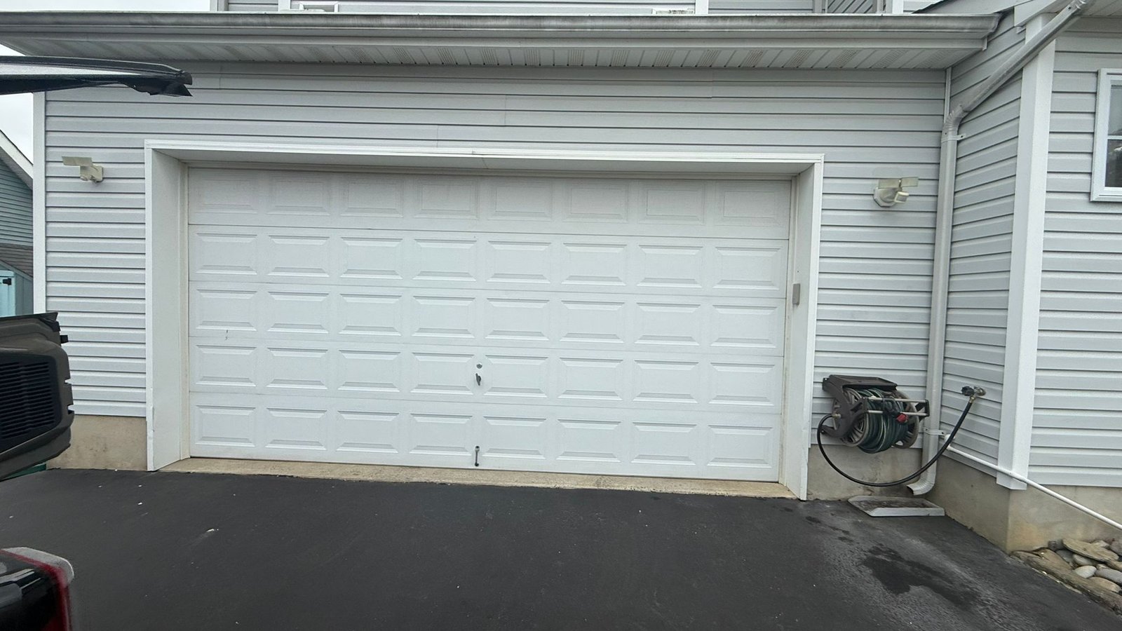 New Door Installation - Classic White Traditional Door Replacement in Fair Lawn completed in Fair Lawn, NJ, NJ by Ez2Fix Garage Door Repair